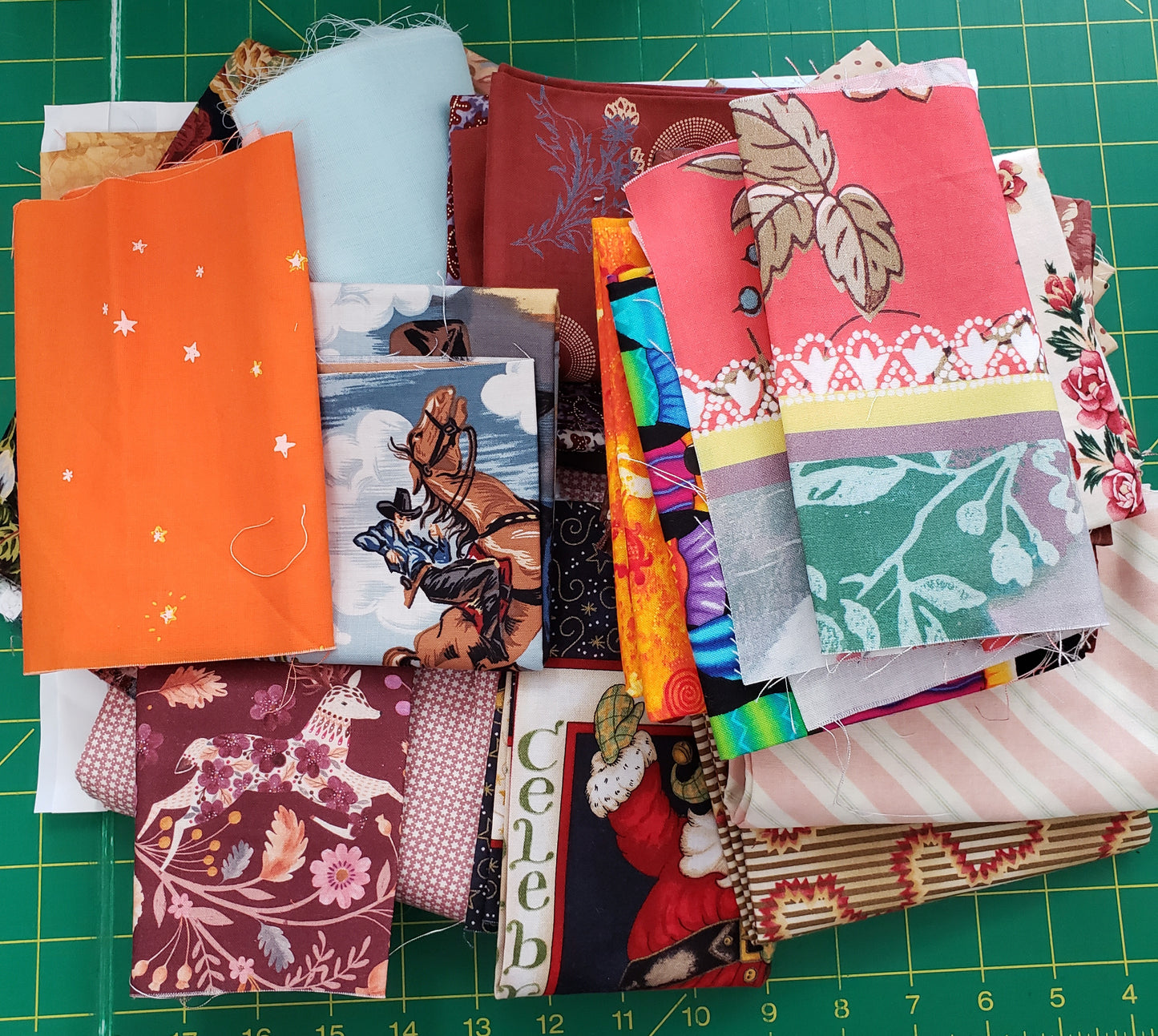 a pile of colorful fabrics