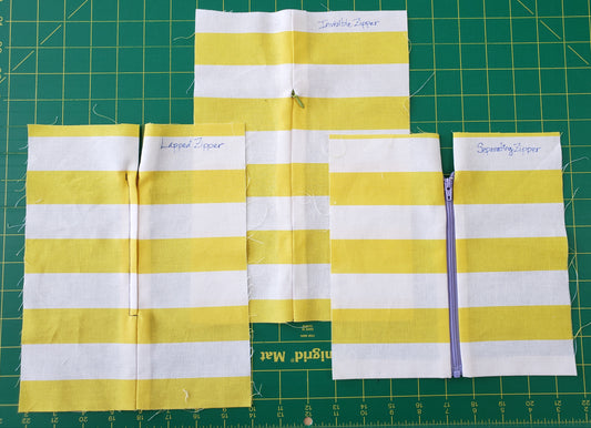 3 examples of zipper styles on yellow and white striped fabric