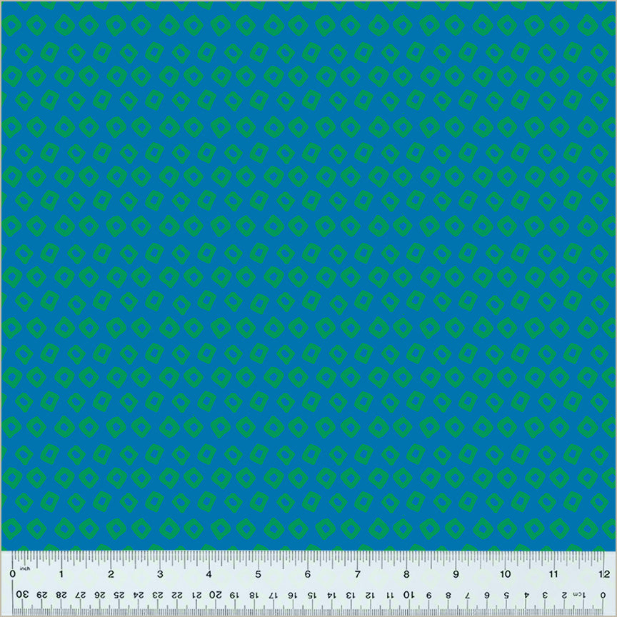 Shibori Design, Provence/Pasture colors. Blue background with dark green square-ish donut shapes in rows throughout the design.