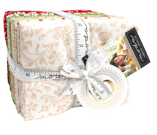 Stack of fabric swatches with a measuring tape and a photo card on a white background