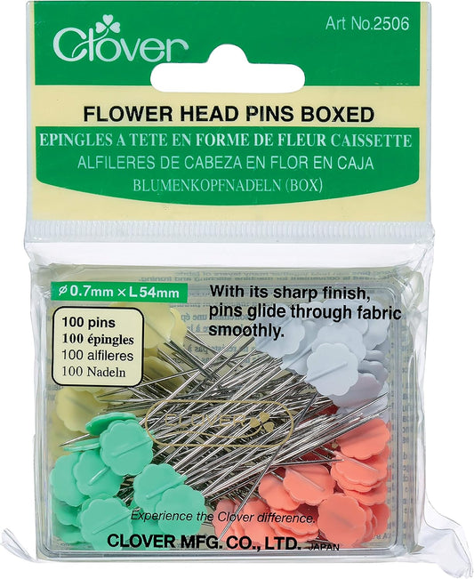 clover flower head pins in a clear box