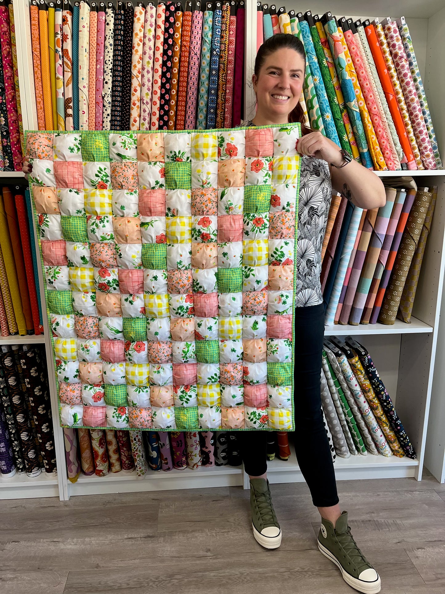 MacKenzie with her quilt