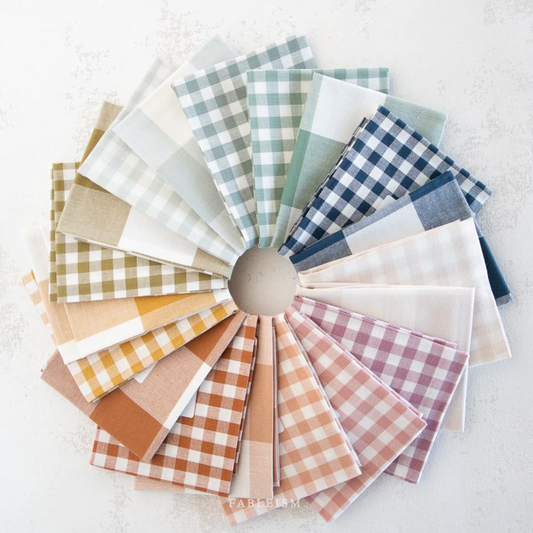 A splay of checkered fabric in pastel rainbow shades