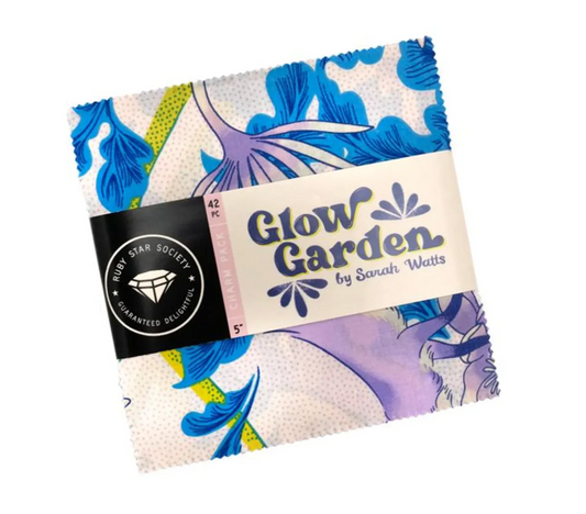 Packaged fabric with floral design and 'Glow Garden by Sarah Watts' label on a white background