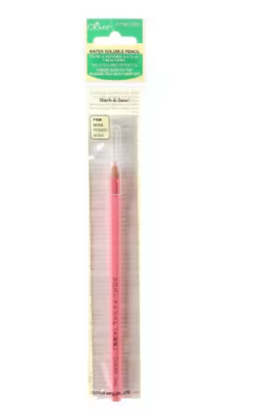 Red water-soluble pencil in packaging with a green label on a white background