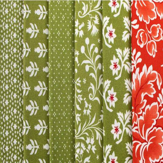 Collection of green and red floral patterned fabrics.