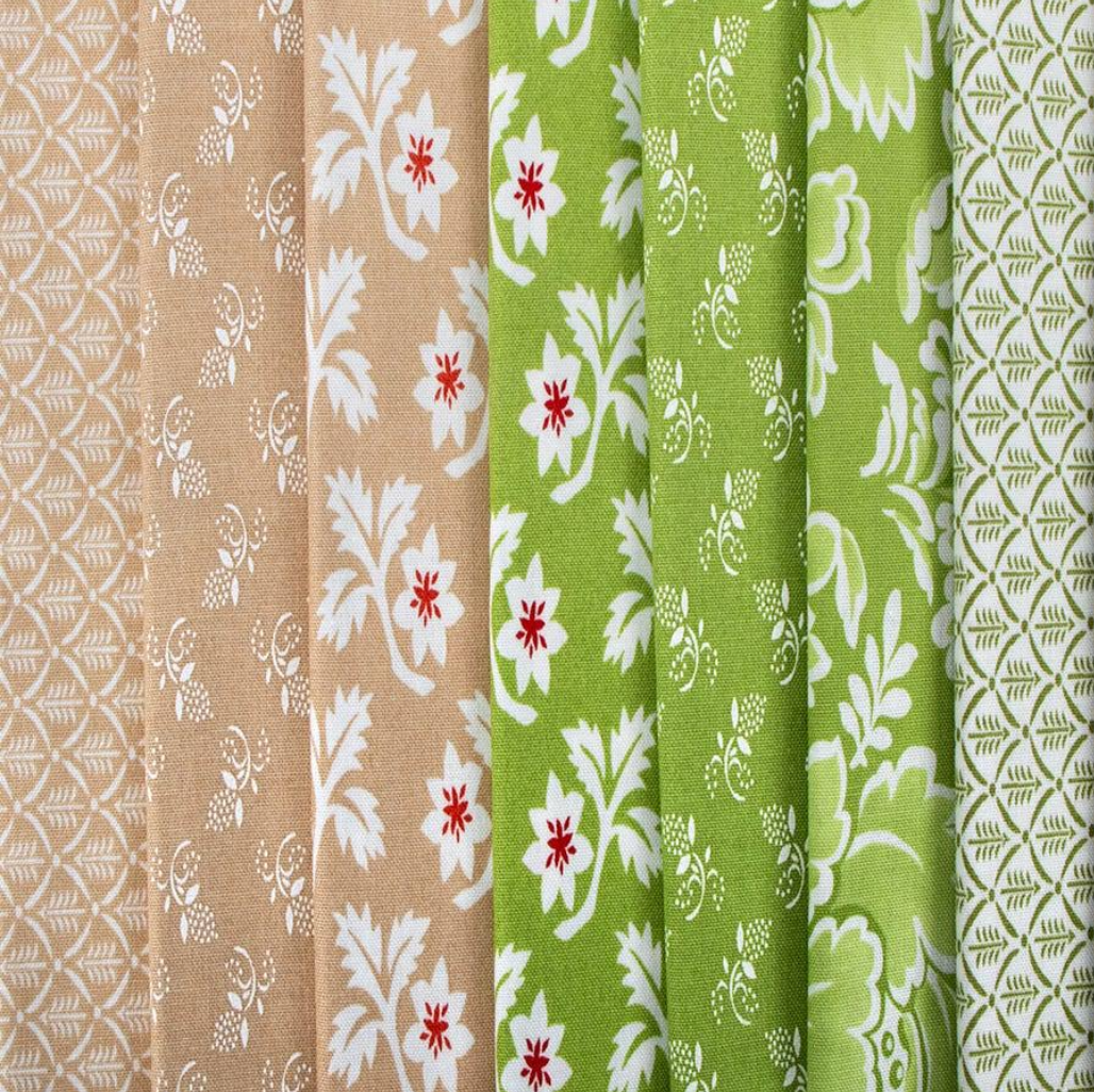 Collection of fabric swatches with various patterns and colors.