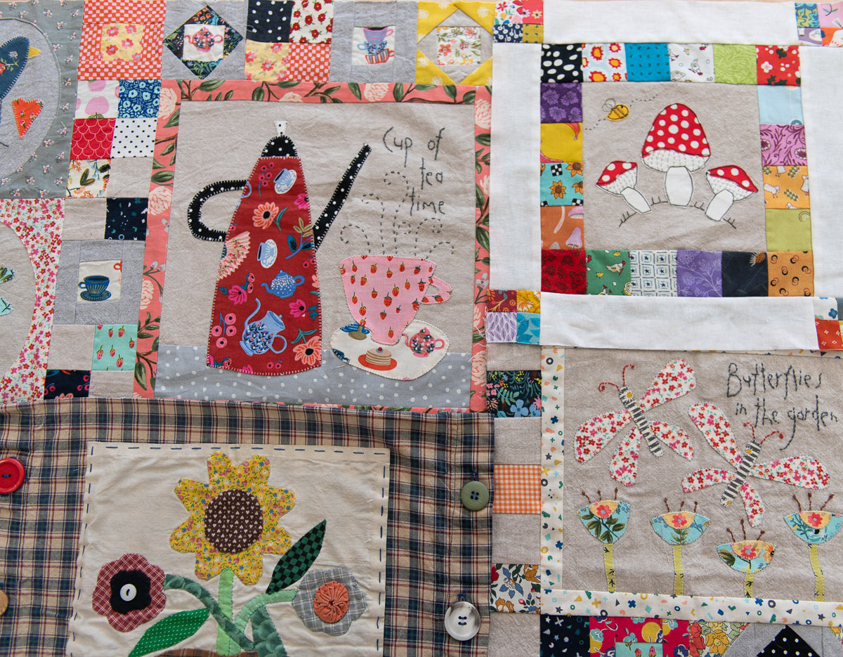Collection of colorful quilted panels with various designs including a teapot, flowers, and nature-themed elements.