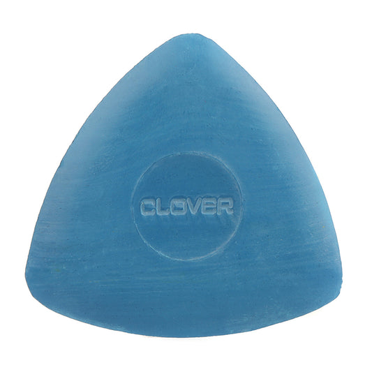 a piece of blue, triangular tailor's chalk