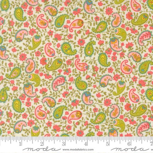 Pink and green paisley print with pink flowers and green leafy vines winding between on a cream background