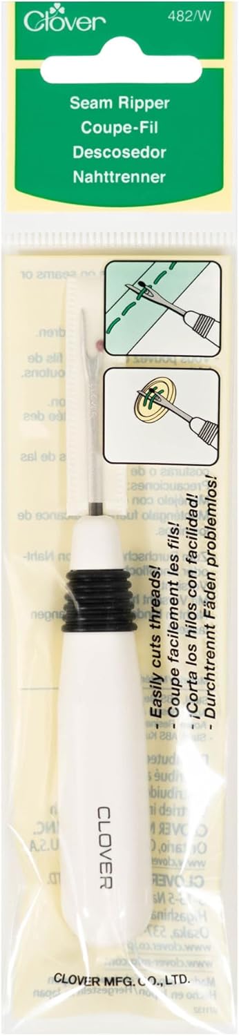 a white plastic clover seam ripper in its packaging