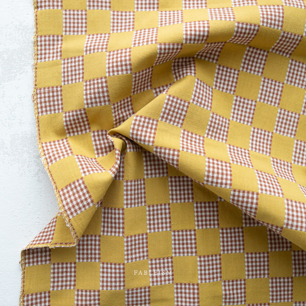 large yellow checks mixed with smaller checks