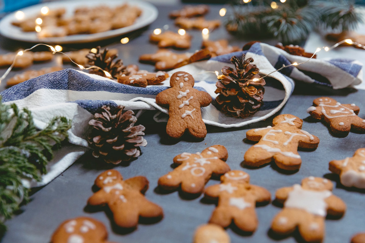 brown gingerbread cookies with pine cones and lights