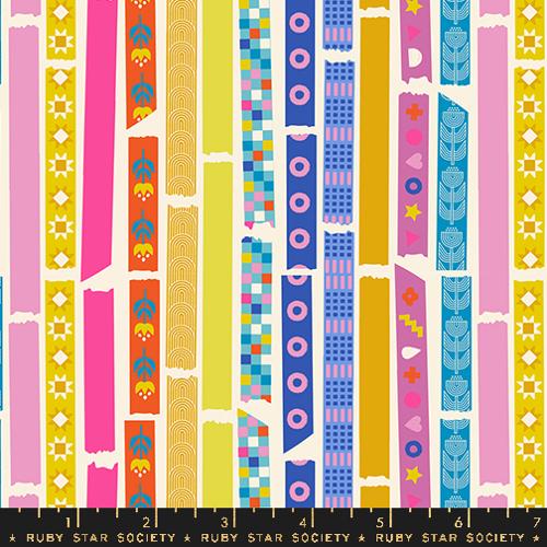 Colorful patterned fabric with vertical stripes and geometric designs, featuring the Ruby Star Society label.