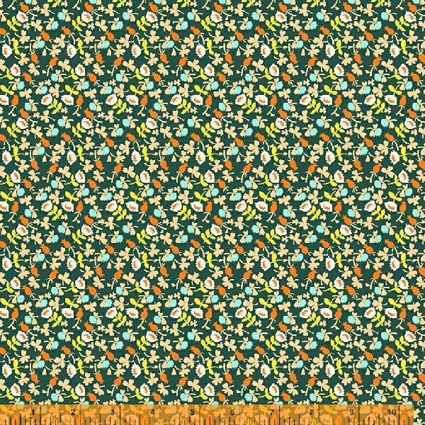 A calico fabric with small white flowers with orange, blue and yellow accents, against a dark background