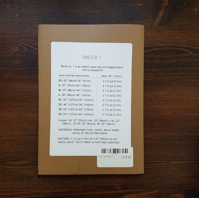 Back of the physical paper pattern, showing measuring information and fabric requirements