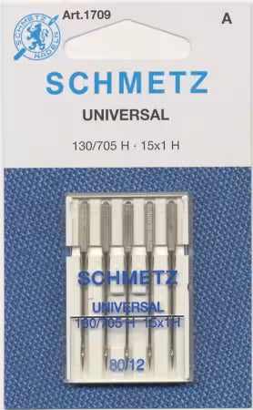 Pack of Schmetz universal needles on a blue and white background