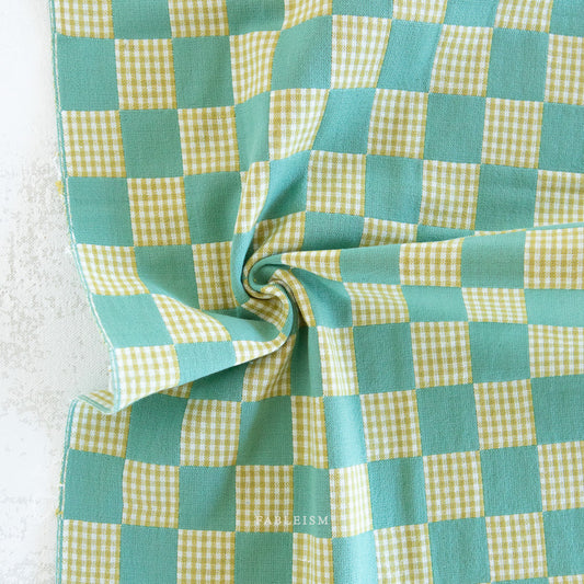 Turquoise and lime green checkered fabric 