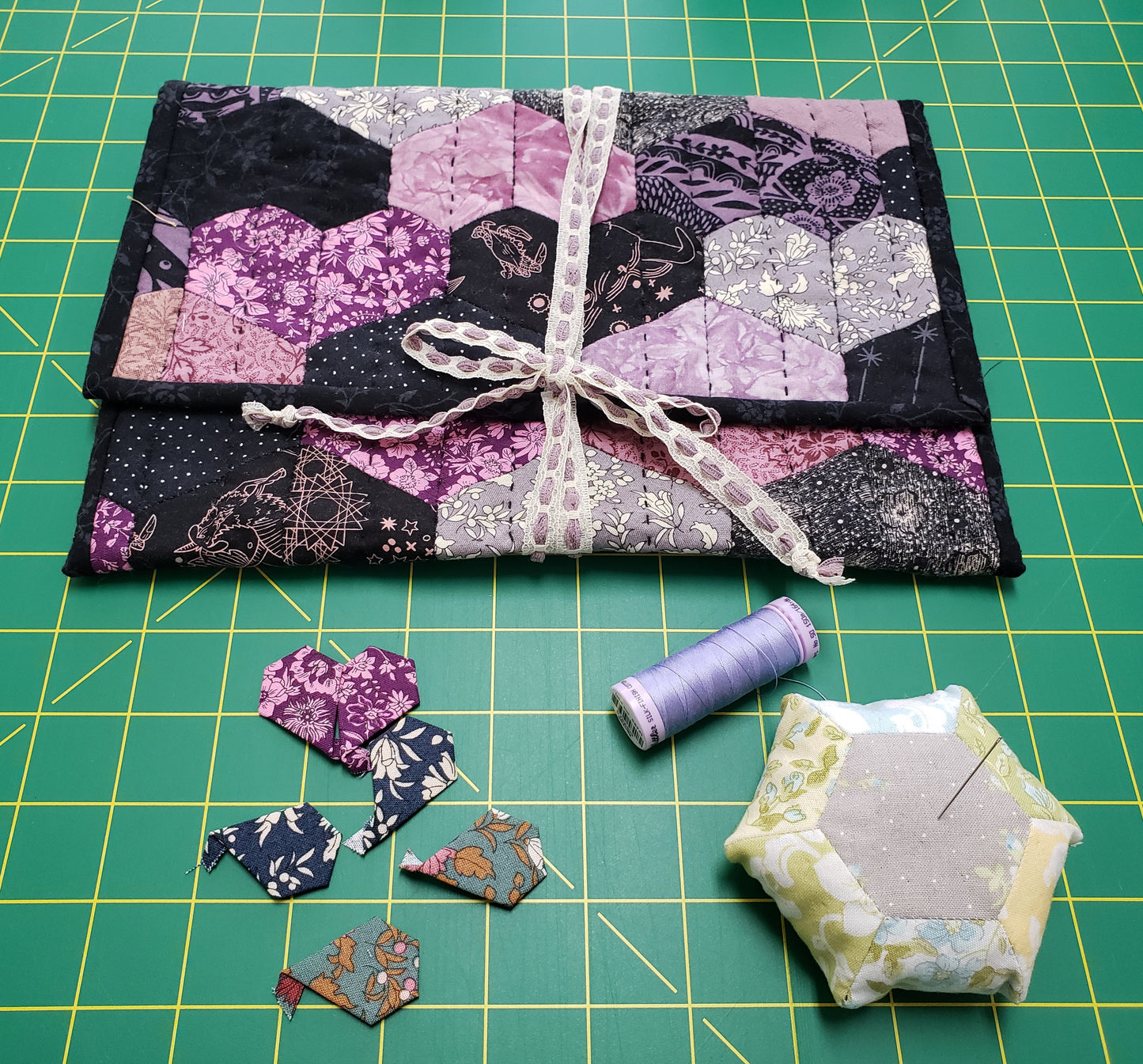 Hand stitched hearts quilted pouch with sewing tools