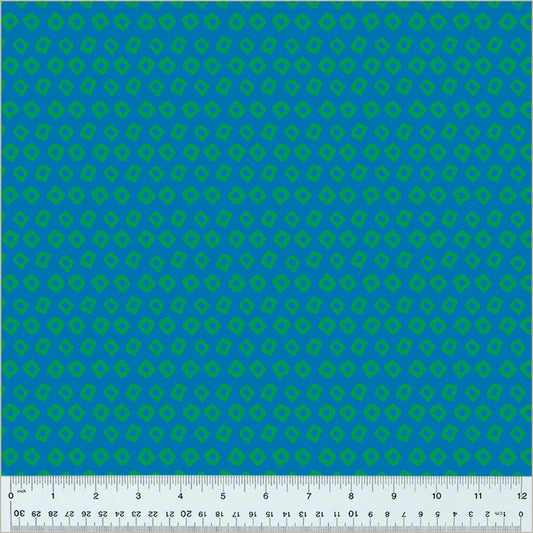 Shibori Design, Provence/Pasture colors. Blue background with dark green square-ish donut shapes in rows throughout the design.