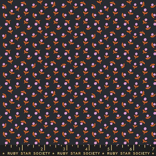 small pink and orange flowers on soft black
