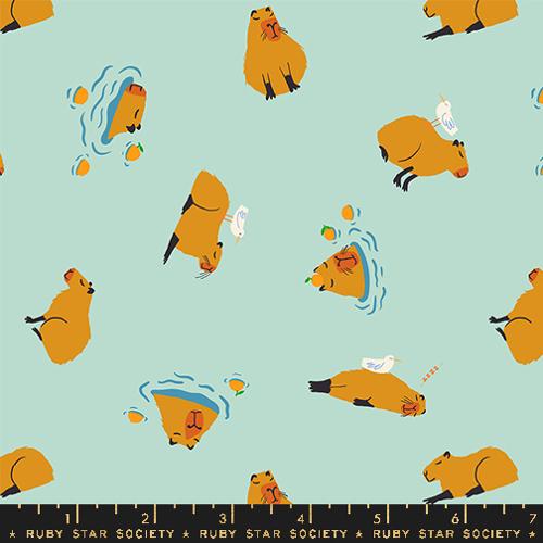 minty fabric with Capybaras