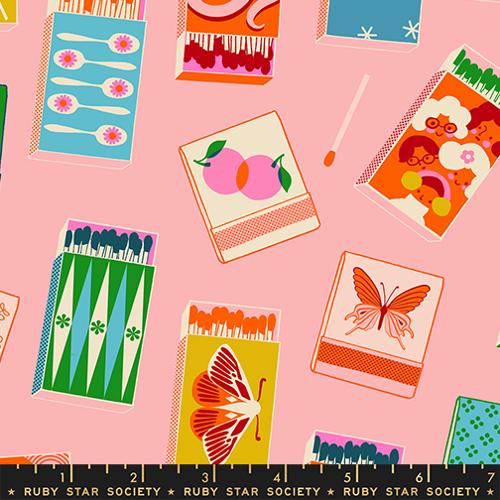 Pattern of colorful matchboxes and cards on a pink background with a Ruby Star Society label.