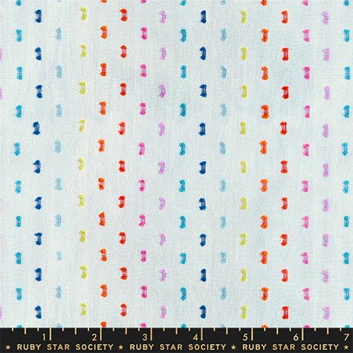 Patterned fabric with colorful small shapes on a light blue background, labeled Ruby Star Society.