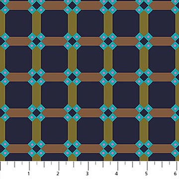 Fabric with a geometric pattern on a navy background, measured against a ruler.