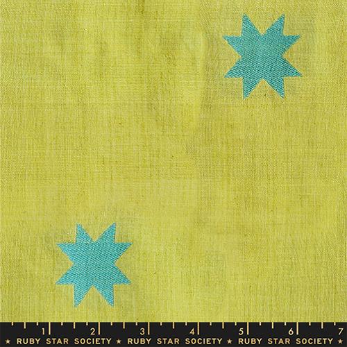 Fabric with turquoise stars on a yellow-green background, featuring Ruby Star Society label.