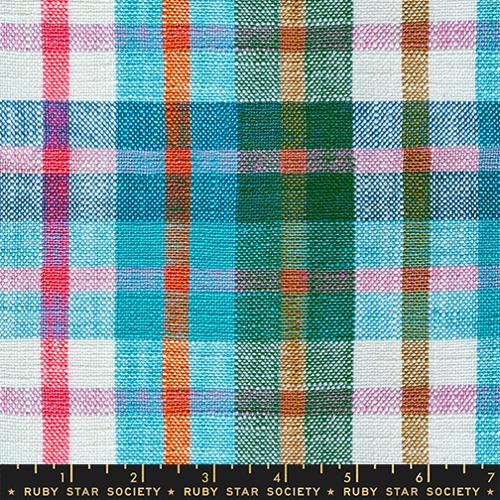 Plaid fabric with multicolor pattern on a white background, featuring Ruby Star Society label.