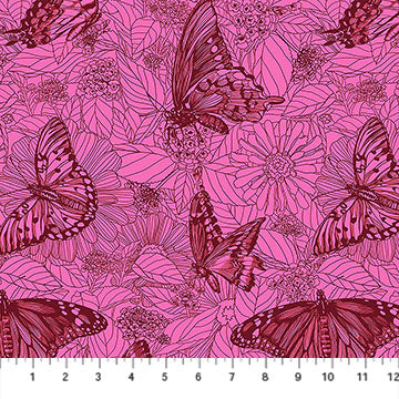 Butterfly and floral pattern on pink fabric with a ruler at the bottom.