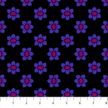 Pattern of purple flowers with pink centers on a black background, measured against a ruler.
