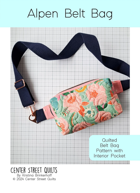 Quilted belt bag with floral design on a grid background, featuring the brand 'Center Street Quilts'.