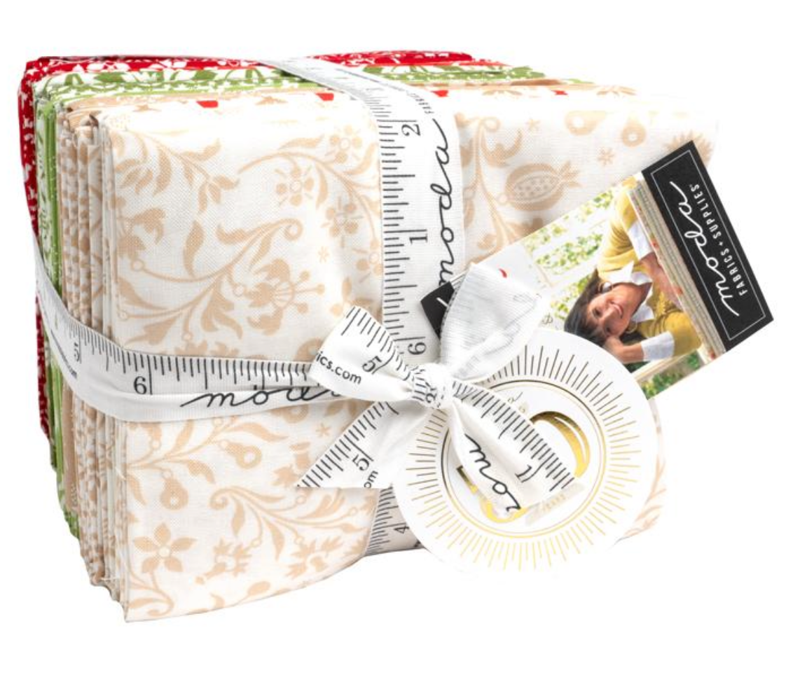 Stack of fabric swatches with a measuring tape and a photo card on a white background