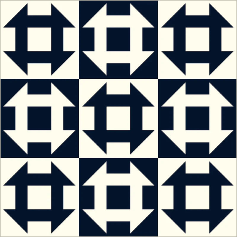 Pattern of blue and white geometric shapes arranged in a grid.