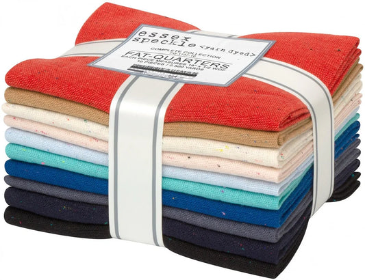 Stack of colorful fabric fat quarters with a label on a white background