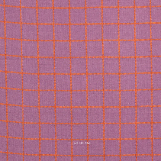 Grid pattern with orange lines on a purple background, branded 'Fableism'.