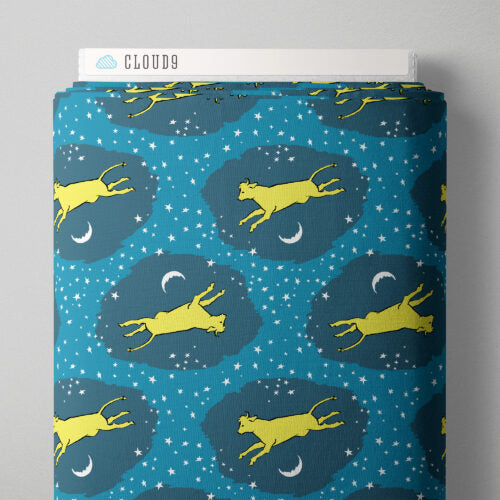 Fabric roll with cat and moon pattern on a blue background, branded 'Cloud9'.