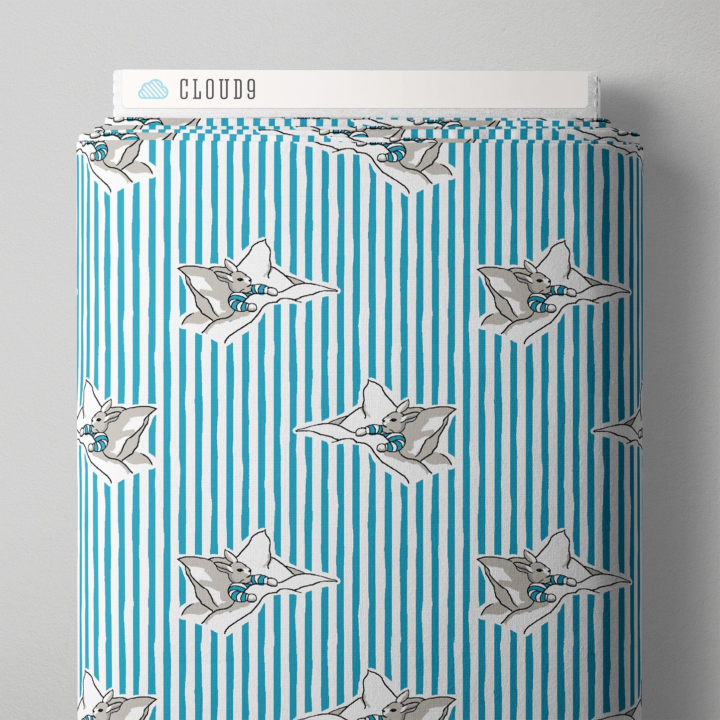 Patterned fabric with cartoon characters on a blue and white striped background, branded 'Cloud9'.