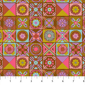 Colorful geometric patterned fabric with a ruler at the bottom