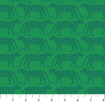 Pattern of leopards on a green background with a white ruler at the bottom.