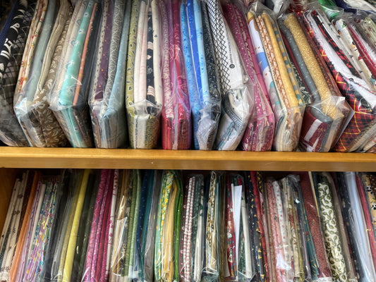 Fabric bundles on the shelf