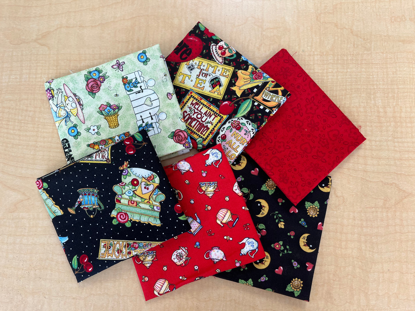 Version 1: a display of 6 fat quarters in V1 Mary Engelbreit pack