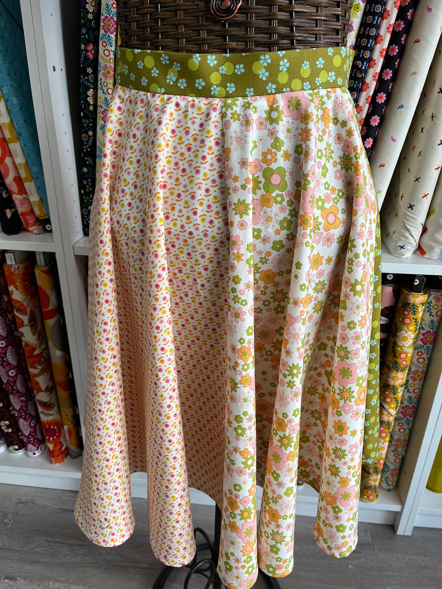 Floral patterned skirt on a mannequin in a fabric store