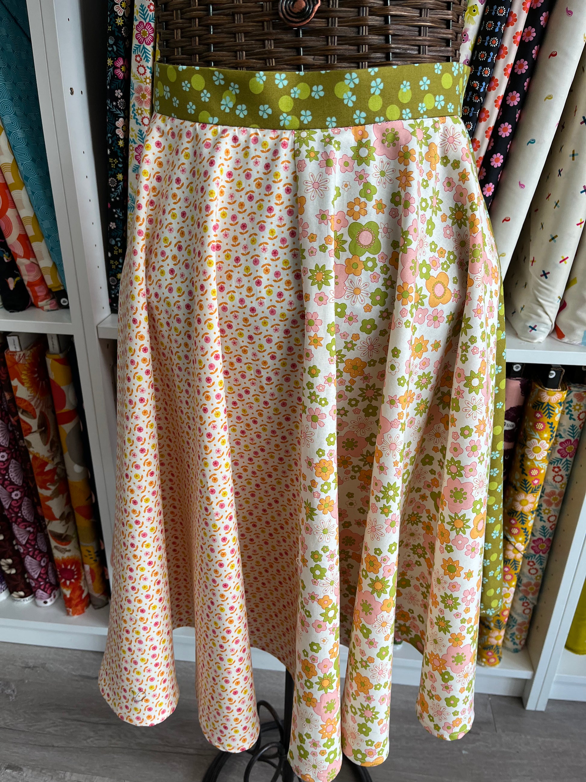Floral patterned skirt on a mannequin in a fabric store