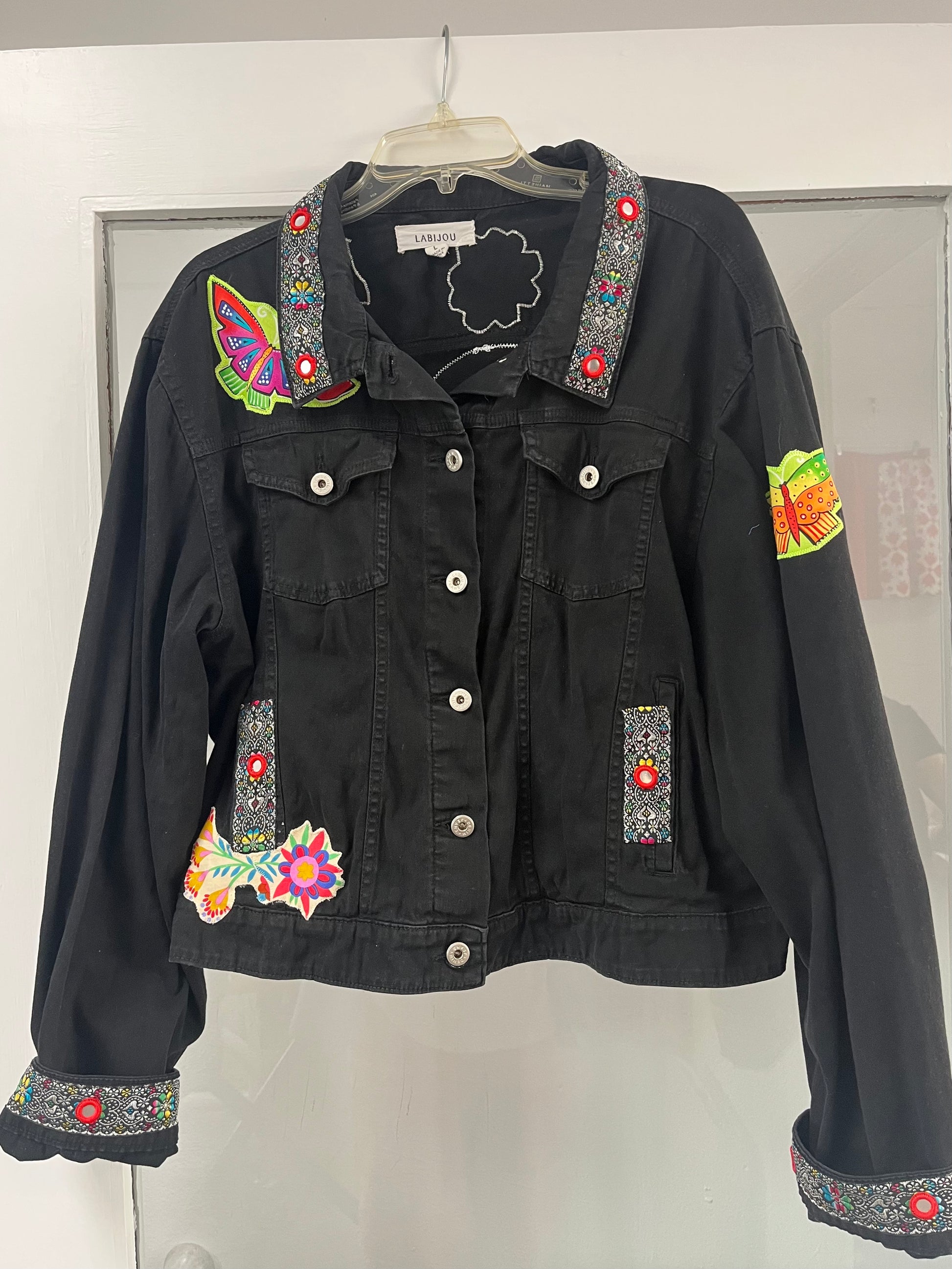 Black jacket with decals.