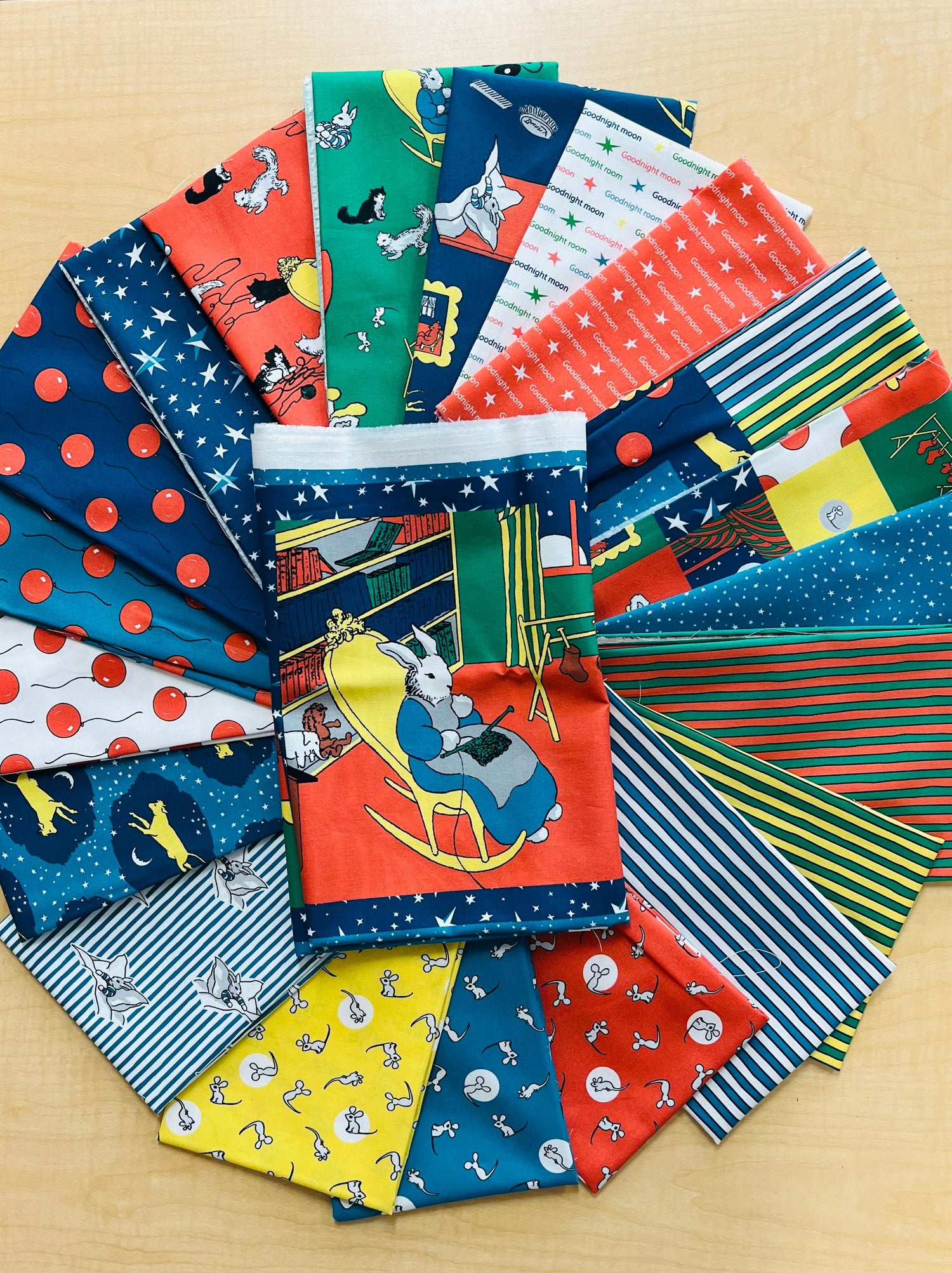 20 different fabric swatches in multicolors with animals.