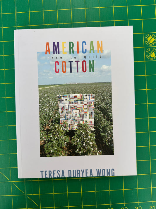 Book cover of 'American Cotton' by Teresa Diryea Wong on a green grid background