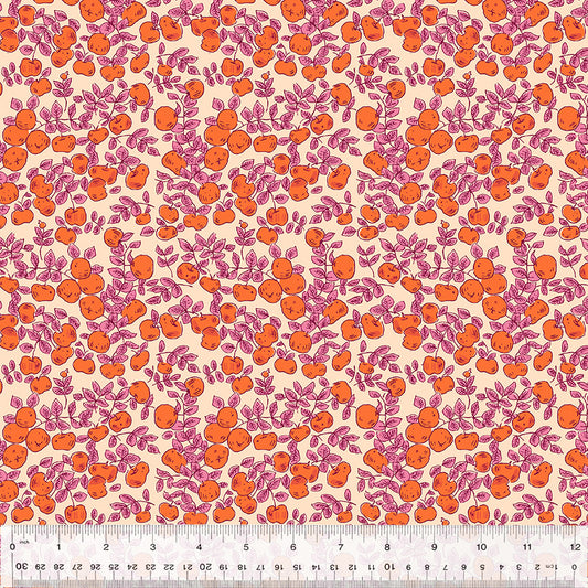 apples against a peach background